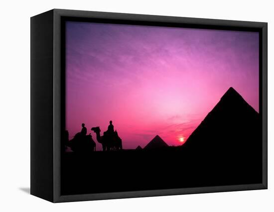 Colorful Sunset Silhouetting Men and Camels at the Great Pyramids of Giza, Egypt-Bill Bachmann-Framed Premier Image Canvas