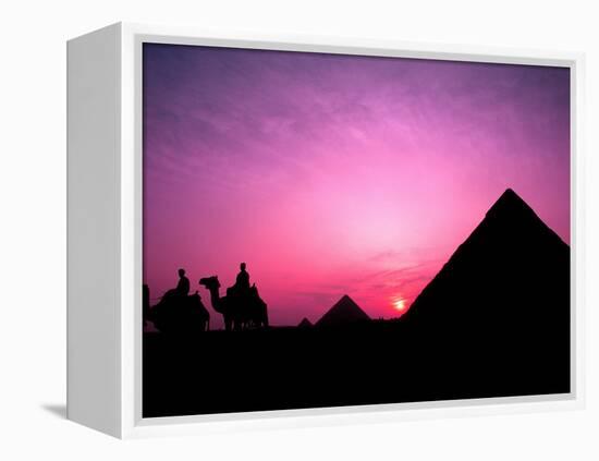 Colorful Sunset Silhouetting Men and Camels at the Great Pyramids of Giza, Egypt-Bill Bachmann-Framed Premier Image Canvas