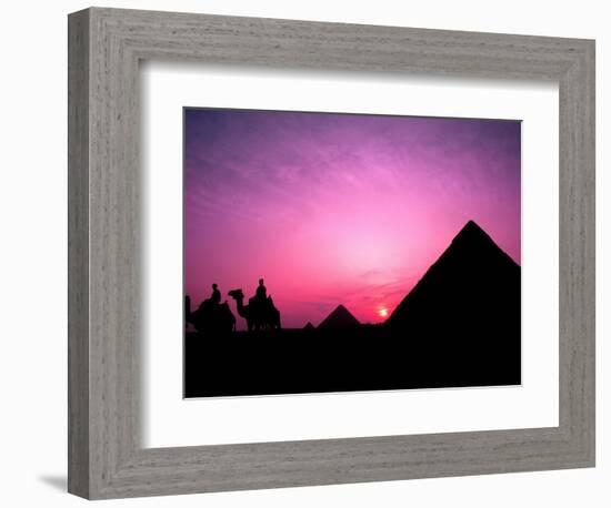 Colorful Sunset Silhouetting Men and Camels at the Great Pyramids of Giza, Egypt-Bill Bachmann-Framed Photographic Print