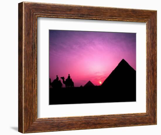 Colorful Sunset Silhouetting Men and Camels at the Great Pyramids of Giza, Egypt-Bill Bachmann-Framed Photographic Print