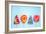 Colorful Vibrant Lollipops, Flat Lay on Blue Background-Marcin Jucha-Framed Photographic Print