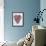 Coloured Chocolate Beans Forming Heart-null-Framed Photographic Print displayed on a wall
