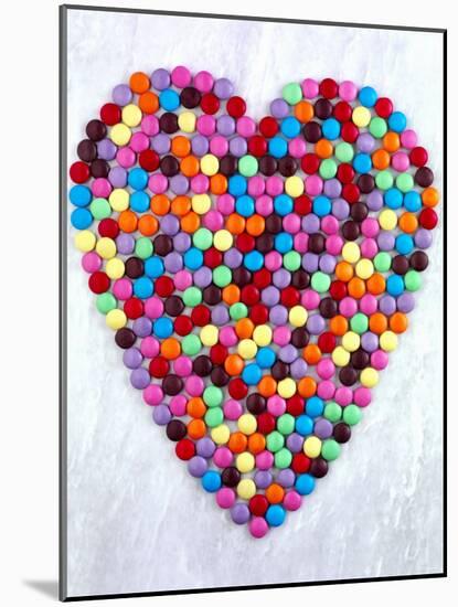 Coloured Chocolate Beans Forming Heart-null-Mounted Photographic Print