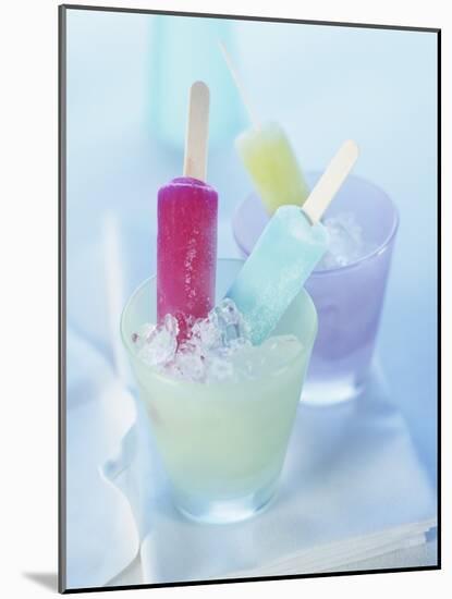 Coloured Ice Lollies in Glasses of Crushed Ice-Ian Garlick-Mounted Photographic Print