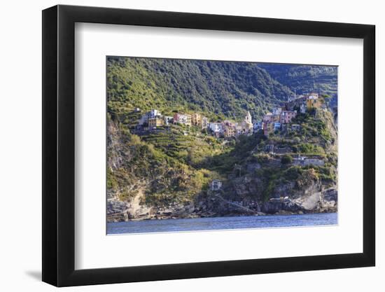 Colourful houses and cliffs atop rocky promontory, Corniglia, Cinque Terre, UNESCO World Heritage S-Eleanor Scriven-Framed Photographic Print