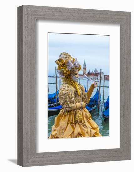 Colourful mask and costume of the Carnival of Venice, famous festival worldwide, Venice, Veneto, It-Roberto Moiola-Framed Photographic Print