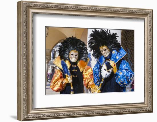 Colourful masks and costumes of the Carnival of Venice, famous festival worldwide, Venice, Veneto, -Roberto Moiola-Framed Photographic Print