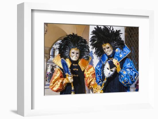 Colourful masks and costumes of the Carnival of Venice, famous festival worldwide, Venice, Veneto, -Roberto Moiola-Framed Photographic Print