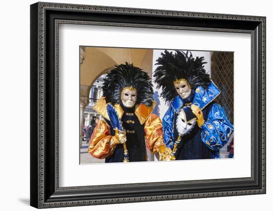 Colourful masks and costumes of the Carnival of Venice, famous festival worldwide, Venice, Veneto, -Roberto Moiola-Framed Photographic Print