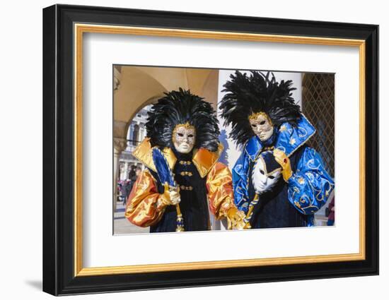 Colourful masks and costumes of the Carnival of Venice, famous festival worldwide, Venice, Veneto, -Roberto Moiola-Framed Photographic Print