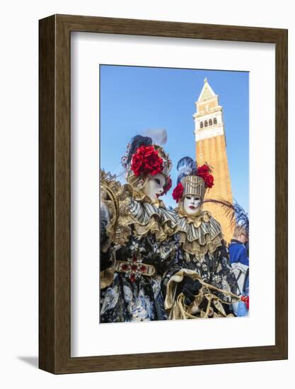 Colourful masks and costumes of the Carnival of Venice, famous festival worldwide, Venice, Veneto, -Roberto Moiola-Framed Photographic Print