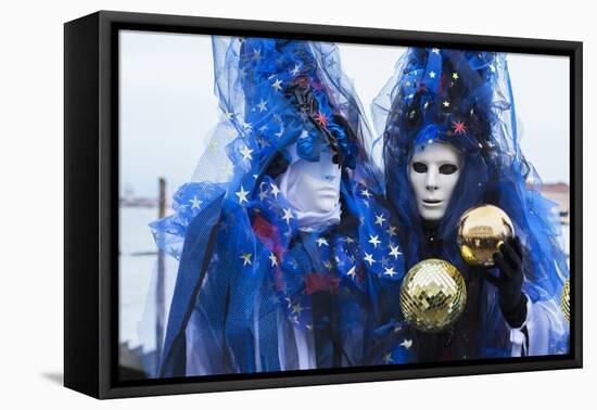 Colourful masks and costumes of the Carnival of Venice, famous festival worldwide, Venice, Veneto, -Roberto Moiola-Framed Premier Image Canvas