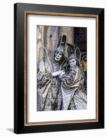 Colourful masks and costumes of the Carnival of Venice, famous festival worldwide, Venice, Veneto, -Roberto Moiola-Framed Photographic Print