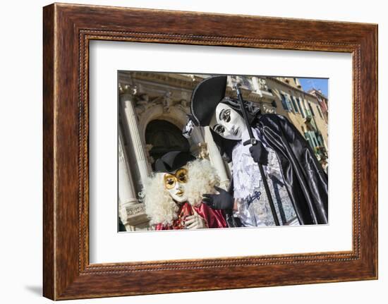 Colourful masks and costumes of the Carnival of Venice, famous festival worldwide, Venice, Veneto, -Roberto Moiola-Framed Photographic Print