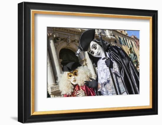 Colourful masks and costumes of the Carnival of Venice, famous festival worldwide, Venice, Veneto, -Roberto Moiola-Framed Photographic Print