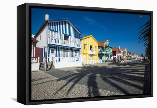 Colourful Stripes Decorate Traditional Beach House Style on Houses in Costa Nova, Portugal, Europe-Alex Treadway-Framed Premier Image Canvas