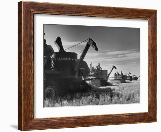 Combines Being Used to Harvest Wheat-Ed Clark-Framed Photographic Print