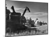Combines Being Used to Harvest Wheat-Ed Clark-Mounted Photographic Print
