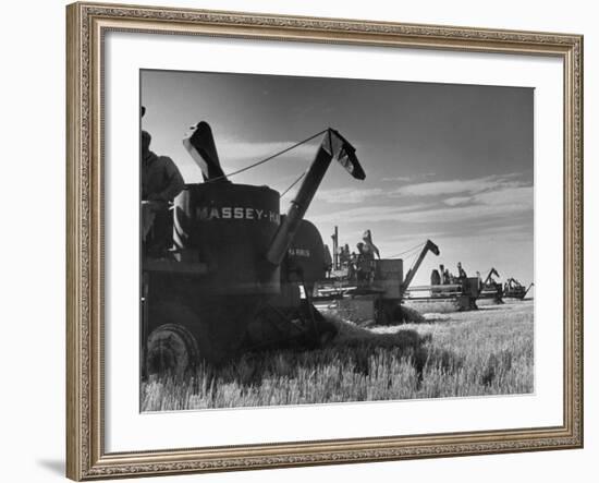 Combines Being Used to Harvest Wheat-Ed Clark-Framed Photographic Print