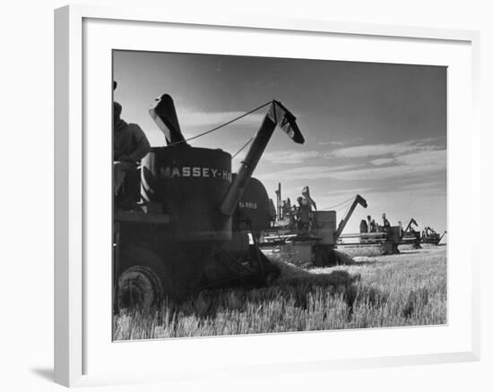 Combines Being Used to Harvest Wheat-Ed Clark-Framed Photographic Print