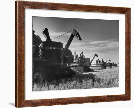 Combines Being Used to Harvest Wheat-Ed Clark-Framed Photographic Print