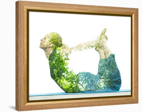 Combining Nature with Spiritual Yoga in a Creative Portrait of a Young Woman Lying with Her Body Ar-Victor Tongdee-Framed Premier Image Canvas