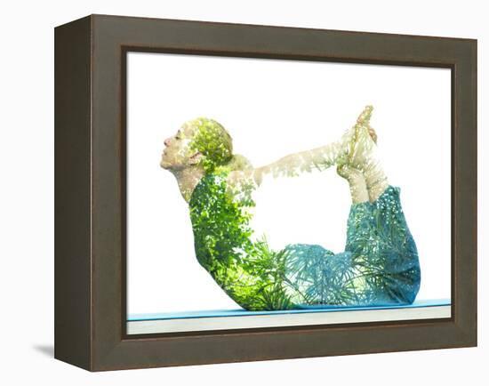 Combining Nature with Spiritual Yoga in a Creative Portrait of a Young Woman Lying with Her Body Ar-Victor Tongdee-Framed Premier Image Canvas