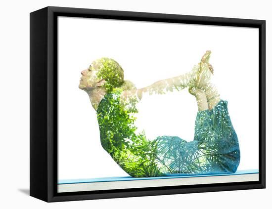 Combining Nature with Spiritual Yoga in a Creative Portrait of a Young Woman Lying with Her Body Ar-Victor Tongdee-Framed Premier Image Canvas