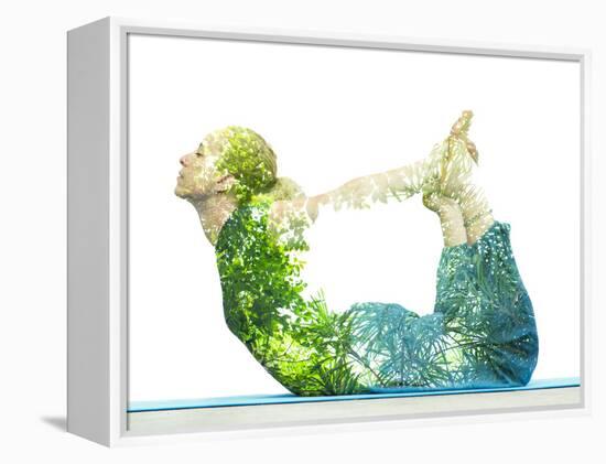 Combining Nature with Spiritual Yoga in a Creative Portrait of a Young Woman Lying with Her Body Ar-Victor Tongdee-Framed Premier Image Canvas