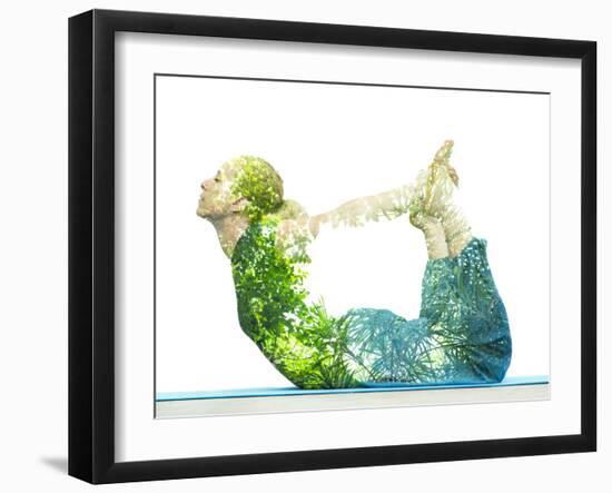 Combining Nature with Spiritual Yoga in a Creative Portrait of a Young Woman Lying with Her Body Ar-Victor Tongdee-Framed Photographic Print