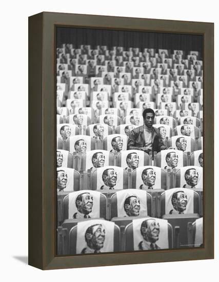 Comedian Bill Cosby Sitting in Empty Auditorium Filled with Copies of His Likeness on Each Seat-Michael Rougier-Framed Premier Image Canvas