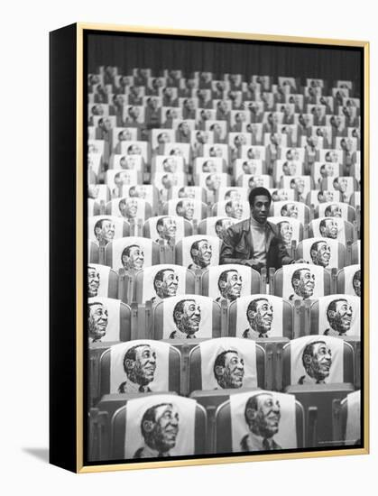Comedian Bill Cosby Sitting in Empty Auditorium Filled with Copies of His Likeness on Each Seat-Michael Rougier-Framed Premier Image Canvas
