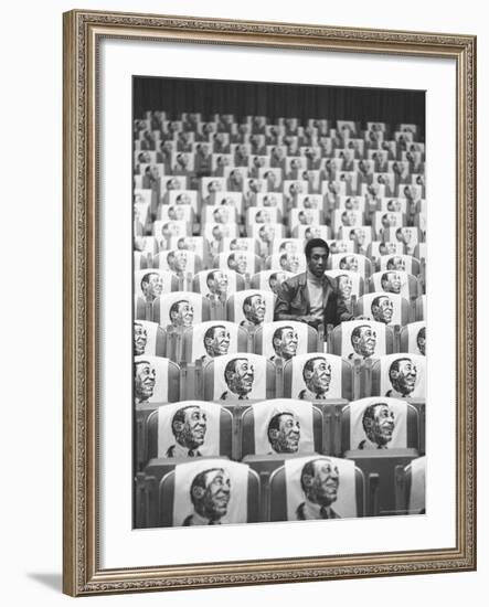 Comedian Bill Cosby Sitting in Empty Auditorium Filled with Copies of His Likeness on Each Seat-Michael Rougier-Framed Premium Photographic Print