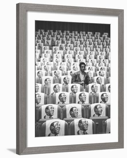 Comedian Bill Cosby Sitting in Empty Auditorium Filled with Copies of His Likeness on Each Seat-Michael Rougier-Framed Premium Photographic Print