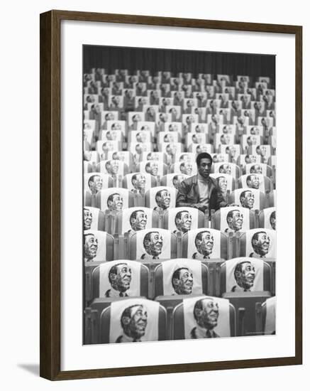 Comedian Bill Cosby Sitting in Empty Auditorium Filled with Copies of His Likeness on Each Seat-Michael Rougier-Framed Premium Photographic Print