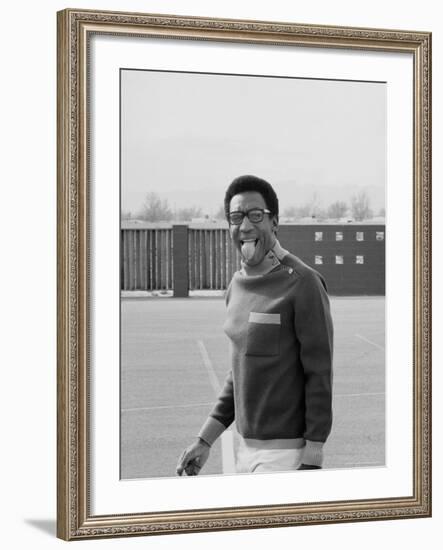 Comedian Bill Cosby Sticking His Tongue Out During Game of Basketball-Michael Rougier-Framed Premium Photographic Print