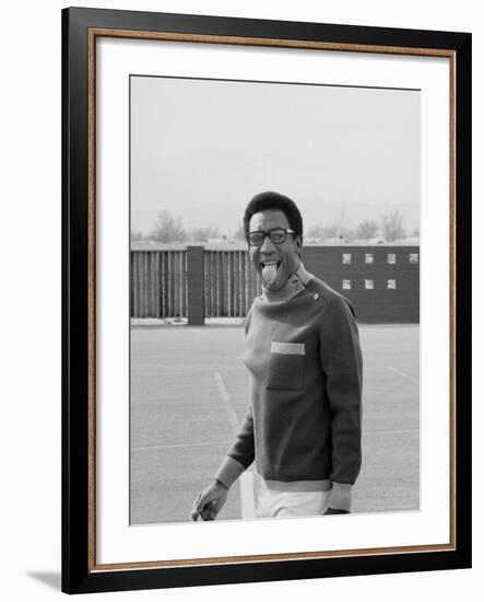 Comedian Bill Cosby Sticking His Tongue Out During Game of Basketball-Michael Rougier-Framed Premium Photographic Print