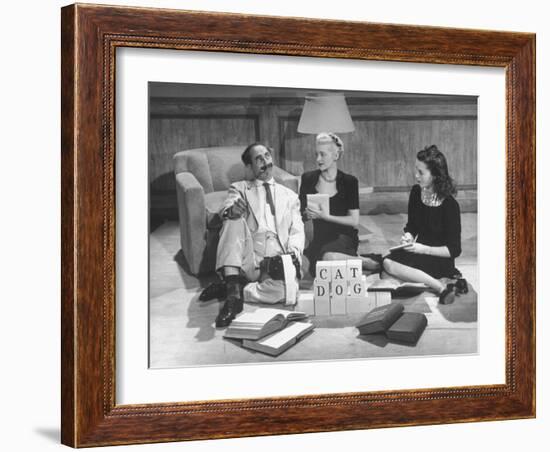 Comedian Groucho Marx Playing a Game with Two Women-null-Framed Photographic Print