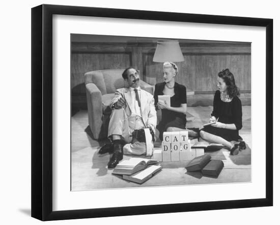 Comedian Groucho Marx Playing a Game with Two Women-null-Framed Photographic Print