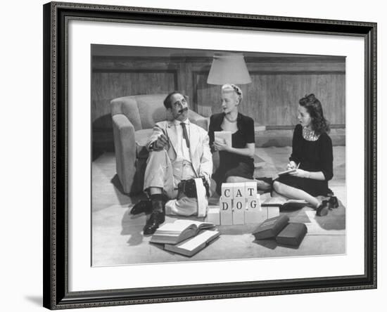 Comedian Groucho Marx Playing a Game with Two Women-null-Framed Photographic Print