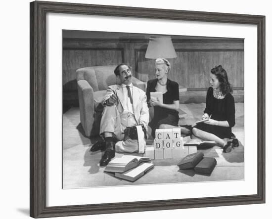 Comedian Groucho Marx Playing a Game with Two Women-null-Framed Photographic Print