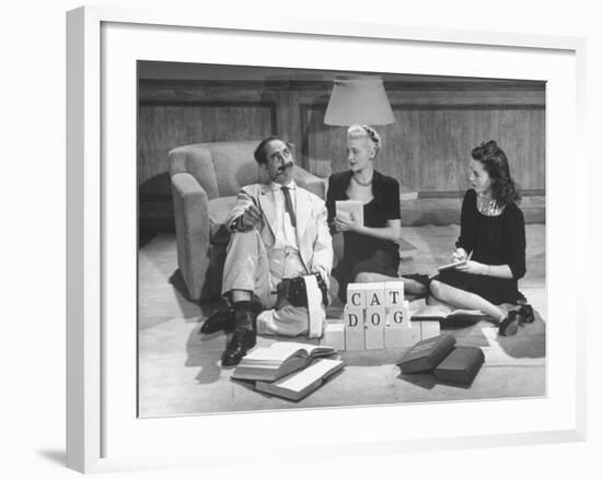 Comedian Groucho Marx Playing a Game with Two Women-null-Framed Photographic Print