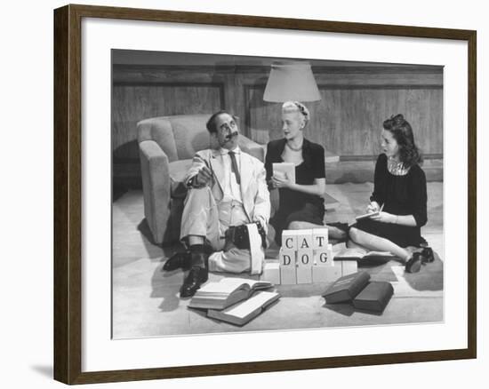 Comedian Groucho Marx Playing a Game with Two Women-null-Framed Photographic Print