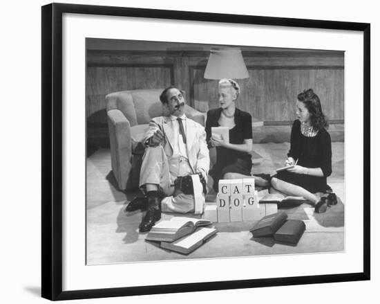 Comedian Groucho Marx Playing a Game with Two Women-null-Framed Photographic Print