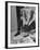 Comedian Mort Sahl at Home Reading Newspaper-Grey Villet-Framed Premium Photographic Print