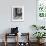 Comedian Mort Sahl at Home Reading Newspaper-Grey Villet-Framed Premium Photographic Print displayed on a wall
