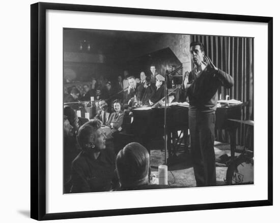 Comedian, Mort Sahl Entertaining at a Night-Club Called "Mister Kelly's"-null-Framed Premium Photographic Print