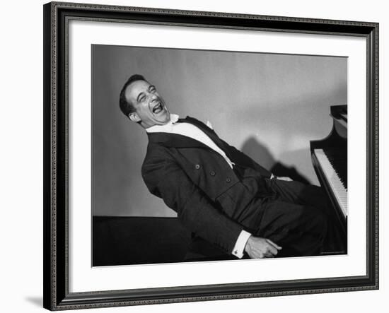 Comedian Pianist Victor Borge, in White Tie and Tails, Sitting at Piano and Making Funny Faces-Peter Stackpole-Framed Premium Photographic Print