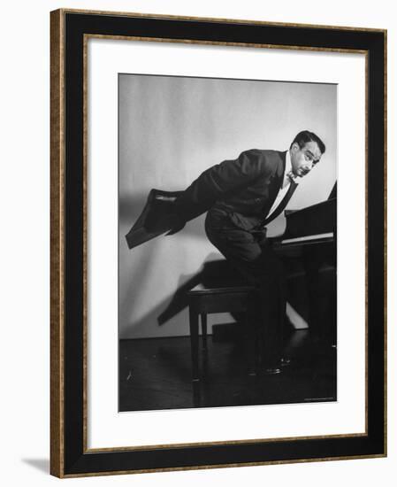 Comedian Pianist Victor Borge, in White Tie and Tails, Standing at Piano and Making Funny Faces-Peter Stackpole-Framed Premium Photographic Print