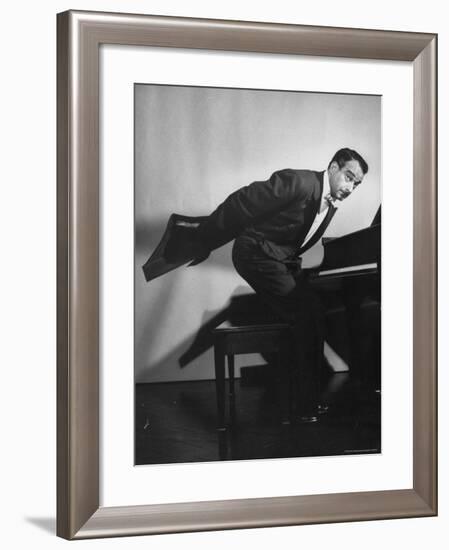 Comedian Pianist Victor Borge, in White Tie and Tails, Standing at Piano and Making Funny Faces-Peter Stackpole-Framed Premium Photographic Print